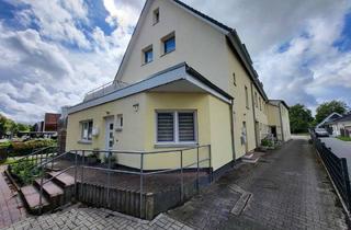 Mehrfamilienhaus kaufen in 23611 Bad Schwartau, Bad Schwartau - Modernisiertes Mehrfamilienhaus mit 8 Wohnungen und Garagen (Faktor 15,84) in 23611 Bad Schwartau