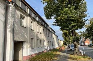 Mehrfamilienhaus kaufen in Bürgerstraße 15-17, 19322 Wittenberge, Solide Kapitalanlage - Mehrfamilienhaus mit 14 Wohnungen und 20 Garagen - auf großem Grundstück