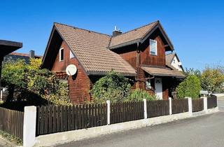 Haus kaufen in 97539 Wonfurt, Wonfurt - Erleben Sie das behagliche Wohngefühl eines Holzhauses... perfekt auf einem sonnigen Eckgrundstück mit 500m² gelegen!