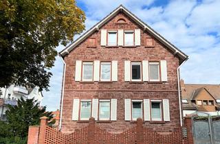 Wohnung kaufen in 63225 Langen, Charmante Dachgeschosswohnung mit historischem Flair und modernem Komfort im Zentrum von Langen