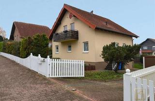 Haus kaufen in 55234 Flomborn, Christian Dik Immobilien / Gepflegt, familienfreundlich und rundum Garten in ruhiger Lage