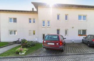 Wohnung kaufen in 04774 Dahlen, Ideale Kapitalanlage: Erdgeschosswohnung mit eigenem Gartenanteil und Stellplatz