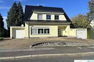 Einfamilienhaus kaufen in 59439 Holzwickede, Großes, freistehendes Einfamilienhaus,120 m² Wohnfläche auf 396 m² Grundstück mit zwei Garagen!