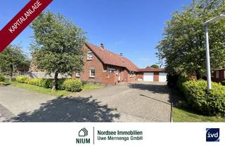 Haus kaufen in 26524 Berumbur, FRIESENHAUS MIT GARAGE UND CARPORT | 2 VERMIETETE WOHNEINHEITEN | KAPITALANLAGE