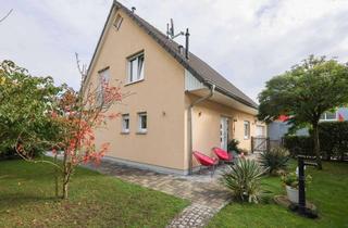 Einfamilienhaus kaufen in 79418 Schliengen, Attraktives Einfamilienhaus mit großzügiger Doppelgarage und gepflegtem Garten - Ideal für Familien!