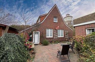 Haus kaufen in 26465 Langeoog, Blick auf den Wasserturm Haus in den Dünen von Langeoog