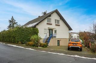 Einfamilienhaus kaufen in 35447 Reiskirchen, Reiskirchen - Vielseitig nutzbares Einfamilienhaus mit gemauertem Kaminofen und gemütlichem Grundriss