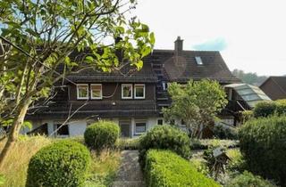 Mehrfamilienhaus kaufen in 34298 Helsa, Attraktives Mehrfamilienhaus mit großem Garten und direktem Waldblick in ruhiger Lage in Helsa OT