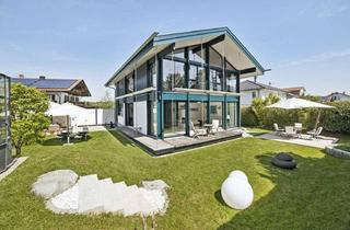 Anlageobjekt in 83254 Breitbrunn, Exklusives Wohnhaus am Chiemsee: Modernes Design trifft auf mediterranen Luxus