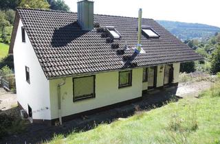 Einfamilienhaus kaufen in 97769 Bad Brückenau, Bad Brückenau - Stadtnahes Einfamilienhaus mit Einliegerwohnung und Garage in Waldrandlage