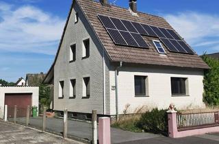 Haus kaufen in 37603 Holzminden, Zweifamilienhaus mit großem Garten und Photovoltaik-Anlage zur Übernahme in Holzminden