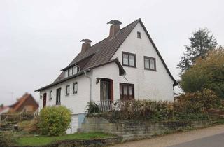 Einfamilienhaus kaufen in 34560 Fritzlar, Einfamilienhaus mit ehemaligem separatem Praxisbereich in Fritzlar-Züschen