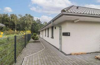 Haus kaufen in 24610 Trappenkamp, Modernes Wohnen mit vielen Extras: Neuwertiger Bungalow mit Garten und 2 Freistellplätzen