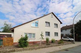 Einfamilienhaus kaufen in 64584 Biebesheim, Einziehen und wohlfühlen: Charmantes Einfamilienhaus mit großem Garten, Terrasse und Garage