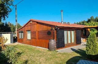 Haus kaufen in 19309 Lenzen, Lenzen (Elbe) - Holzbungalow am Rudower See zu verkaufen