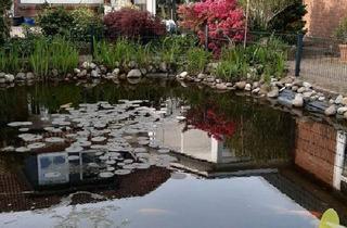 Haus kaufen in 25364 Brande-Hörnerkirchen, Brande-Hörnerkirchen - Haus mit Schwimmbad und Garten mit Teich