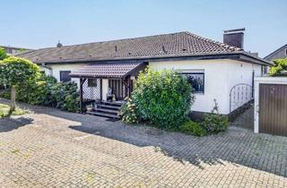 Haus kaufen in 63694 Limeshain, Limeshain - Gemütlicher Bungalow mit idyllischem Garten in zentraler Lage von Rommelhausen