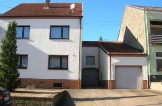 Haus kaufen in 66798 Wallerfangen, Ein- bis Zweifamilienhaus mit großem Garten in ruhiger Umgebung