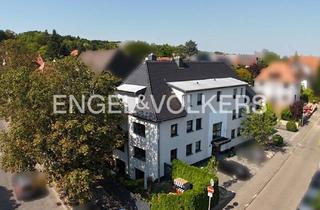 Wohnung kaufen in 61231 Bad Nauheim, Bad Nauheim - Barrierefreie Wohnung mit Gartenanteil