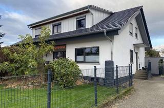 Haus kaufen in 77767 Appenweier, Modernisiertes Wohnhaus mit zwei Einheiten, großzügigem Garten und einer Doppelgarage