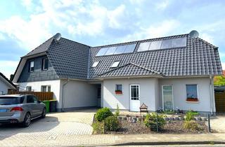 Haus kaufen in 27793 Wildeshausen, Wildeshausen! Zwei vermietete Einfamilienhäuser mit Carport und Garten in zentrumsnaher Siedlungslage