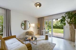 Wohnung kaufen in 85622 Feldkirchen, Feldkirchen - Elegante, neuwertige 2,5-Zimmer-Gartenwohnung mit optimalem Grundriss