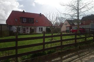 Haus kaufen in 25797 Wöhrden, Wöhrden - Haus im Historischen Ortskern, zwei Wohnungen