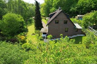 Haus kaufen in 51399 Burscheid, Freistehendes Ein- oder Zweifamilienhaus in Waldrandlage!