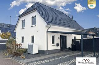 Einfamilienhaus kaufen in 41569 Rommerskirchen, Freist. und energieeffizientes Einfamilienhaus in familienfreundlicher Wohnlage von Rommerskirchen