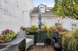 Wohnung kaufen in Audenstraße, 61348 Bad Homburg, Charmante Altbauwohnung: 3 Zimmer mit Sonnenbalkon zum grünen Innenhof - im Herzen von Bad Homburg