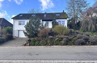 Einfamilienhaus kaufen in 67697 Otterberg, Otterberg - Otterberg - Freistehender Winkelbungalow mit Doppelgarage und tollem Grundstück