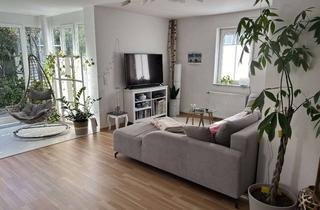 Wohnung kaufen in 64546 Mörfelden-Walldorf, Helle 3-Zimmer-Erdgeschosswohnung mit Wintergarten, Garten, Stellplatz und Keller