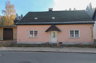 Einfamilienhaus kaufen in Olbernhauer Straße 15, 09544 Neuhausen, Teilsaniertes Einfamilienhaus: 7 Zimmer, 4 Garagen und Nebengelass für individuelle Nutzung