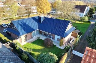 Einfamilienhaus kaufen in 32609 Hüllhorst, Solides Einfamilienhaus mit Einliegerwohnung in zentraler Lage von Hüllhorst