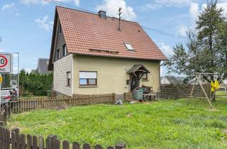 Einfamilienhaus kaufen in 57520 Langenbach, Freistehendes Einfamilienhaus mit großen Grundstück zum selbst verwirklichen in Langenbach