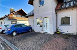 Wohnung kaufen in 97618 Wollbach, Stilvolles Wohnen auf zwei Ebenen – 4-Zimmer-Maisonette in begehrter Lage