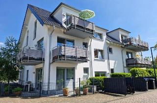 Wohnung kaufen in 50354 Hürth, Hürth - 2-Zimmer-Erdgeschosswohnung mit kleiner Terrasse und Stellplatz