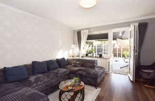 Wohnung kaufen in 38440 Wolfsburg, Modernisierte Erdgeschosswohnung mit Terrasse und Garten!