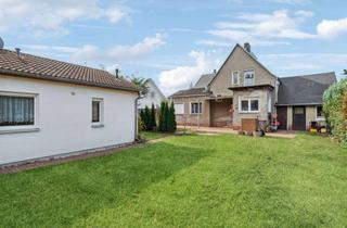 Einfamilienhaus kaufen in 15834 Rangsdorf, Moderner Bungalow plus sanierungsbedürftiges Einfamilienhaus auf großem Grundstück in Rangsdorf