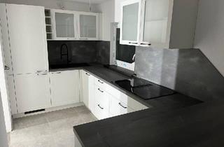 Wohnung kaufen in 55131 Mainz, Mainz - **3 Zimmer Maisonette Wohnung mit 100qm Garten (Komplettsaniert)