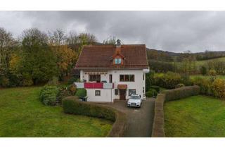 Haus kaufen in 36142 Tann, Komfortables Wohnen mit Weitblick: Zweifamilienhaus in Wendershausen