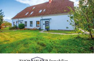 Mehrfamilienhaus kaufen in 23896 Mannhagen, Mannhagen - Mehrfamilienhaus mit drei Wohneinheiten und Garten in 23896 Mannhagen