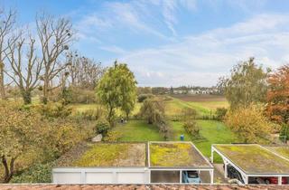 Wohnung kaufen in 76187 Karlsruhe, Karlsruhe - Dachterrasse mit Ausblick in die Natur: geräumige 3-4-Zimmerwohnung und Garage in Knielingen