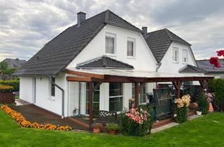 Doppelhaushälfte kaufen in 38471 Rühen, Rühen - Doppelhaushälfte mit Garage und großem Wintergarten