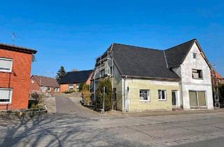 Mehrfamilienhaus kaufen in 25727 Süderhastedt, Süderhastedt - Stark Sanierbedurftiges Mehrfamilienhaus mit Potenzial