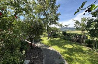 Wohnung kaufen in 79219 Staufen, Staufen im Breisgau - Charaktervolle Erdgeschosswohnung mit Gartenidylle und außergewöhnlichem Flair