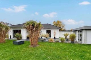 Haus kaufen in 25917 Leck, Neuwertiger Bungalow mit Sonnengarten und Garage in Top-Lage von Leck