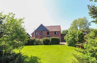 Haus kaufen in 31840 Hessisch Oldendorf, Perfekt für Familien: Teilvermietetes Zweifamilienhaus mit traumhaftem Garten in Heßlingen