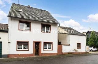 Einfamilienhaus kaufen in 50189 Elsdorf, Vermietetes Einfamilienhaus mit Modernisierungsbedarf und großem Grundstück.