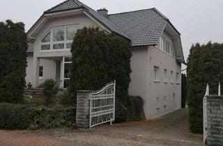 Villa kaufen in 31710 Buchholz, KARSTEN IMMOBILIEN ermöglicht Ihnen: Elegante Villa für Zwei Familien - Stilvolles Wohnen in Perfekt